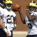 University of Michigan freshman Denard Robinson looks to pass during the first official day of practice at the outdoor football practice facility on Monday afternoon.  Melanie Maxwell | AnnArbor.com